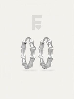 Pendientes de aro bambú, acero quirúrgico, joyería sostenible, diseño natural.