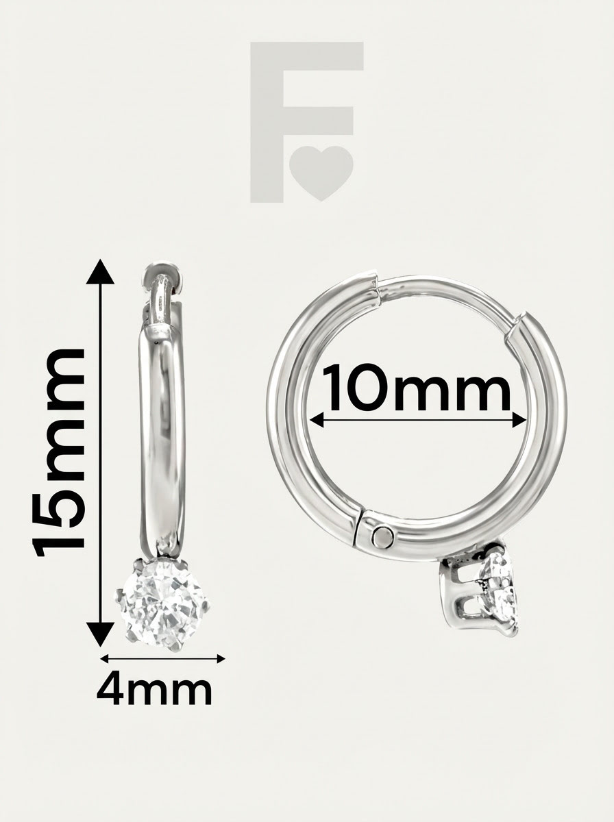 Los pendientes "Aro Solitario" de FLORYNATA son mucho más que un accesorio, son una joya que expresa tu personalidad y tu amor por la elegancia. Su diseño minimalista y el brillo de la circonita los convierten en una pieza única y especial.