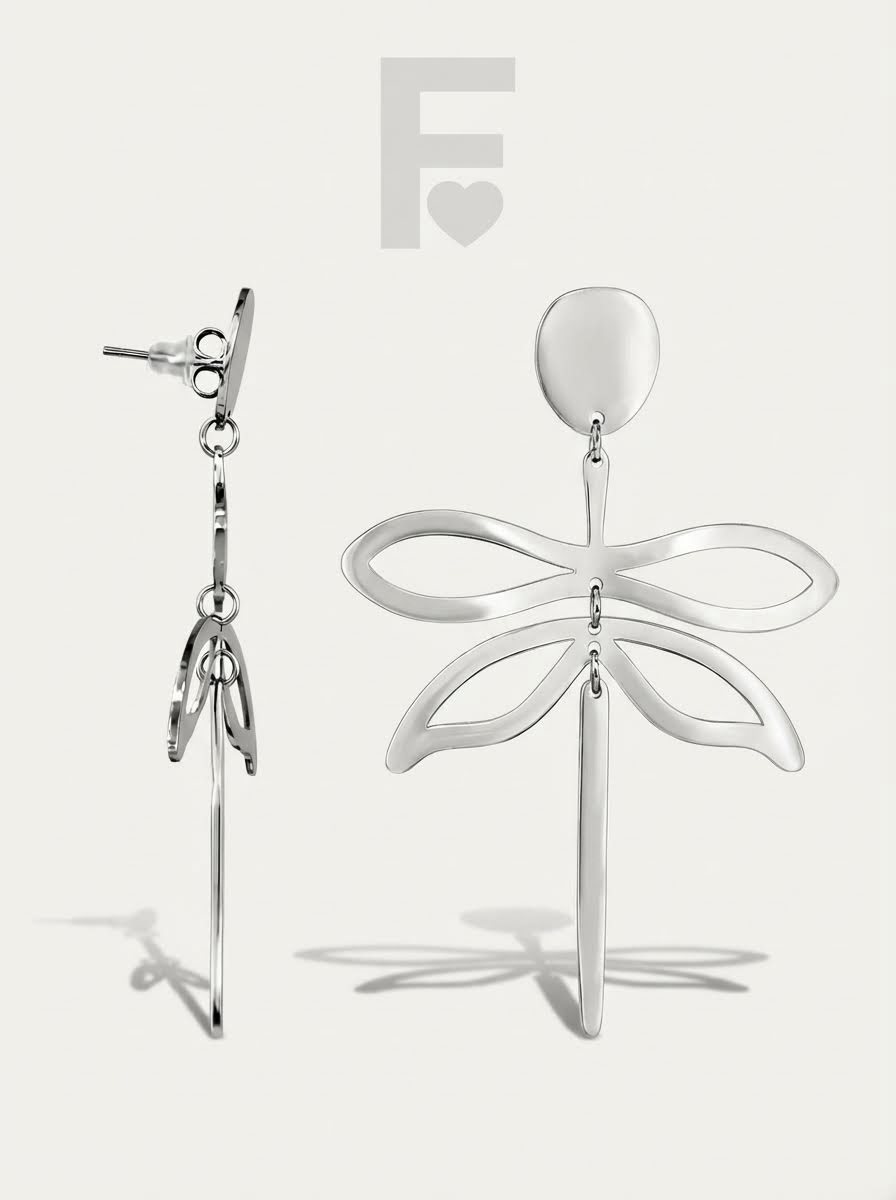 Pendientes "Gran Libélula" de FLORYNATA, detalle lateral que muestra el movimiento y la calidad de sus piezas.